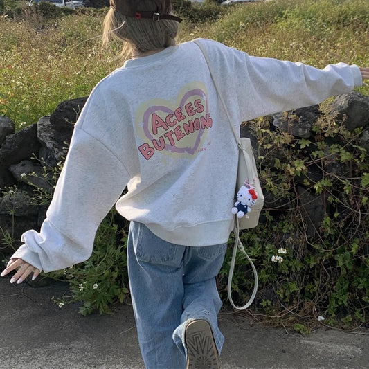 ハート プリント トレーナー レディース 韓国 ファッション バックロゴ オーバーサイズ ガーリー スウェット バックシャン キラキラ トップス 裏起毛