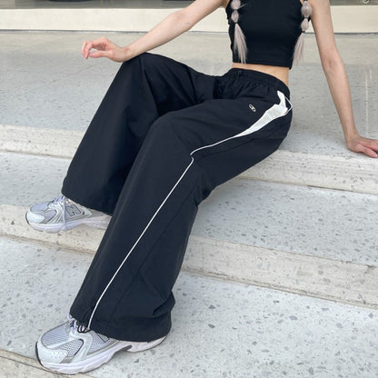 ジャージ ナイロン ワイドパンツ レディース 韓国  ストリート ドローコード ウエスト 裾 絞り ロゴ サイドライン パンツ